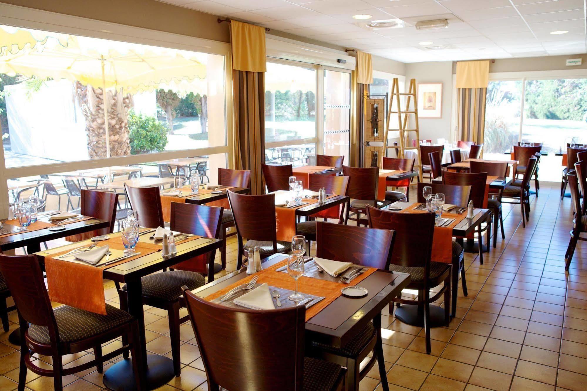 Brit Hotel Marseille Aeroport Mirabeau Restaurante foto
